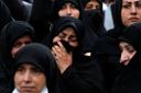 Iranian women attend a mourning ceremony for President Ebrahim Raisi in Tehran (AP/Vahid Salemi)