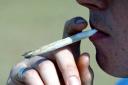 A stock image of a man smoking cannabis. Image: PA Wire