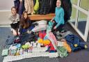 P7 pupils Yve Murdie, Maia Minel and Morven Kenny with the second batch of donations, prior to drop-off at a Sunflower Scotland collection point