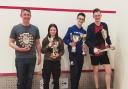 A number of trophies have been presented on the squash court in Haddington. From left: Andrew Light, Phoebe Hamilton, Jamie Pearman and Dylan Pearman