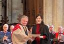 Jeonghee Min, organist at Northesk Church, receives her award for the 'most outstanding candidate' from David Hill MBE, president of The Royal College of Organists at Southwark Cathedral