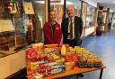 Former Preston Lodge High School pupil Caitlin Johnston returned to her old school witth a donation for the school's breakfast club on behalf of Snappy Shopper. She is pictured alongside the school's headteacher Gavin Calrk