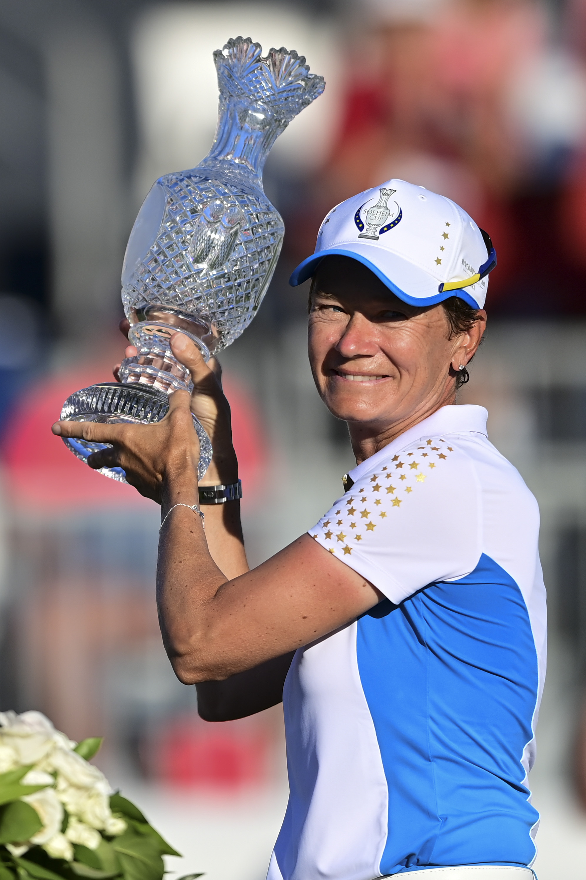 Europe Captain, Catriona Matthew holds up the trophy after defeating the United States at the Solheim Cup golf tournament, Monday, Sept. 6, 2021, in Toledo, Ohio. (AP Photo/David Dermer).
