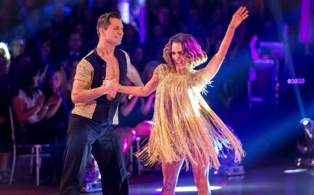 East Lothian Courier: Pasha Kovalev and Caroline Flack on the live show of the BBC programme Strictly Come Dancing. Credit: PA