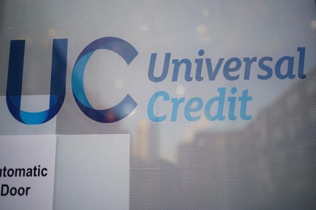 DWP responds to Universal Credit rule which can delay payments rise by two months. (PA)