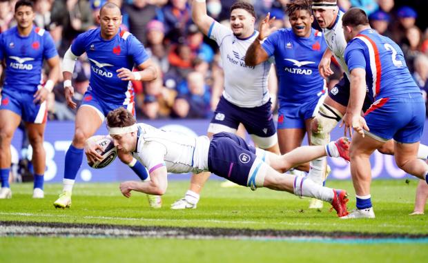 East Lothian Courier: Scotland's Rory Darge dives in to score their side's first try during the Guinness Six Nations match at Murrayfield Stadium, Edinburgh. Picture: Jane Barlow/PA Wire