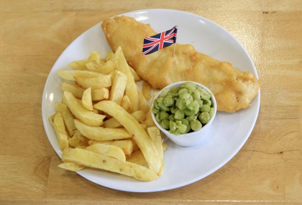 East Lothian Courier: Fish, chips and mushy peas. Credit: PA