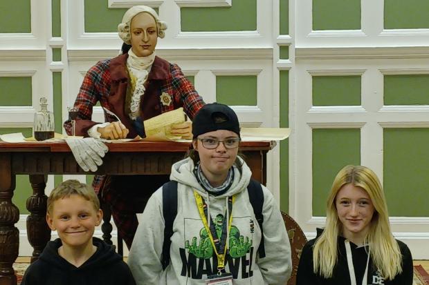 Aidan Stevenson, 11, 16-year-old Ailsa Gear and Sophie Marshal, 15, attended the meeting to promote The Destiny Project.