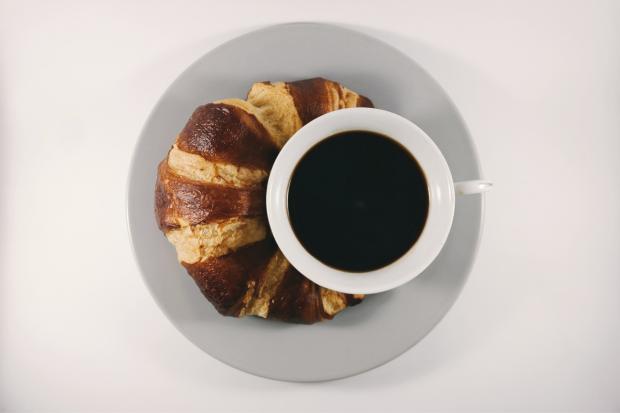 East Lothian Courier: Coffee with a croissant. Credit: Canva
