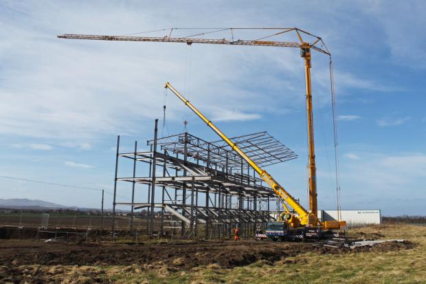 East Lothian Courier: Going . . . work starts on dismantling the greyhound stadium structure. Photo: Angus Bathgate