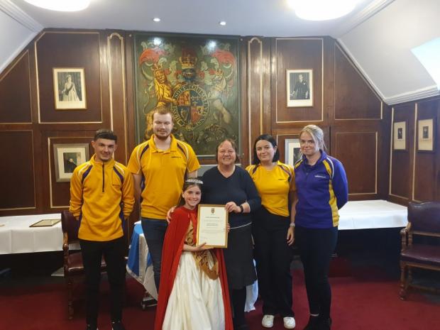 East Lothian Courier: Representatives of Dunbar Leisure Pool Swim Coaching Team were presented with a citizen team award on Monday. Picture: Kevin Searle