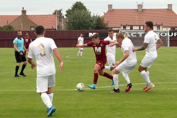 Tranent Juniors (maroon) lost out in their opening day Scottish Lowland Football League fixture to East Kilbride