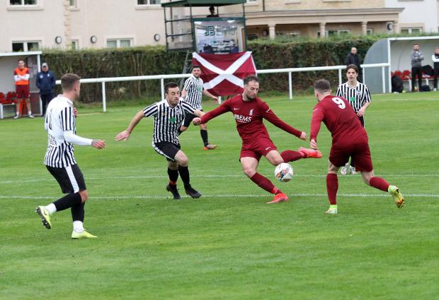 East Lothian Courier: Haddington Athletic (maroon) begin life in the Premier Division against Hill of Beath Hawthorn