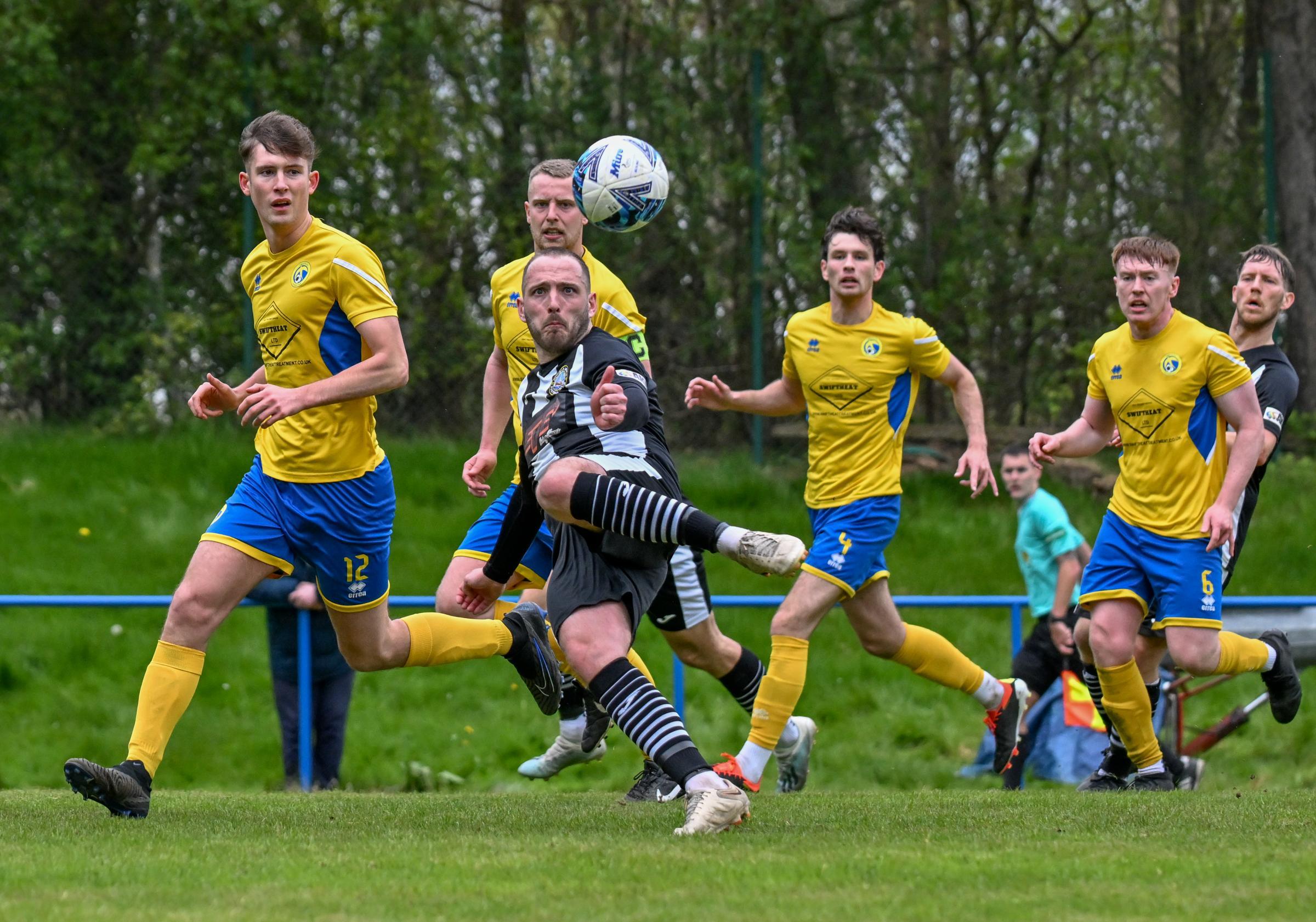 Dunbar United (black and white) bounced back from cup final heartache to Inverkeithing Hillfield Swifts, pictured, with a midweek win. Image: Alan Wilson.
