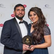 Nazea Saiq and husband Saqib Bashir are celebrating after Dunbar Post Office picked up a national prize. Picture: Andrew Perkins