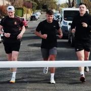Runners (from left) Scott Thomson, Gus Hillhouse and Craig MacDonald have completed a fundraising challenge in aid of Harlawhill Day Care Centre