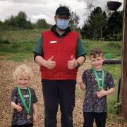 Saul, five, and Jude, seven, were awarded gold medals for their fundraising efforts by ranger Scott Ironside