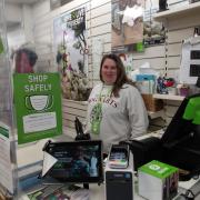 Shared Lives Scottish Ambassador Abby at work in Oxfam shop, Haddington