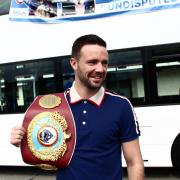 Josh Taylor shows off his newly won belt. Picture: Sinead Robertson