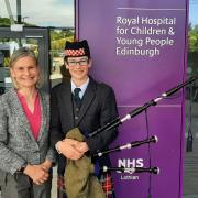 Dr Laura N Young MBE with 13-year-old William Cuthill outside the Royal Hospital for Children and Young People Edinburgh