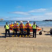 Police and lifeboat crew members at the event