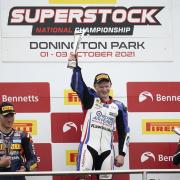 Lewis Rollo (centre) toasts a first victory of the season at Donington Park. Picture: Tim Keeton - Impact Images
