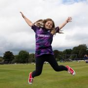 Rebecca Downie got her hands on the first shirt bearing her design ahead of the ICC T20 World Cup