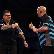 Gary Anderson knocked out Rob Cross to book his place in the quarter-finals of the PDC World Championships. Picture: Steven Paston/PA Wire