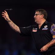 Gary Anderson's bid for a third world title remains on track. Picture: Steven Paston/PA Wire