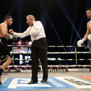 Jack Catterall (left) is spoken to by referee Marcus Madonald in the bout against Josh Taylor at the OVO Hydro, Glasgow. Picture: Steve Welsh/PA Wire