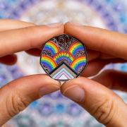 First-ever official coin created for the LGBTQ+ community. Credit: The Royal Mint