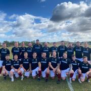 Ryan Mack (back row wearing baseball cap) has put the name of positive mental health charity Changes on the front of the warm-up kit of Tranent Amateur Football Club