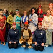 Theatre group Centre Stage in costume as they rehearse for the show
