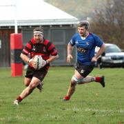 North Berwick (red and black) secured a crucial win over Ross High