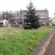An electric vehicle charging hub and two new jet wash bays could be created at the Fisherrow Service station, and landscaping to open space is planned