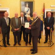 Marion Lauder, with left to right, Cllr Trevor Cessford, Civic Head of Northumberland County Council, Richard Copland (Co’path shop committee), Captain James Evans, EBDA Chairman, Mrs Jeanna Swan, Lord Lieutenant of Berwickshire, and Cllr Watson