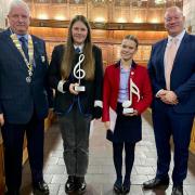 From left, Drew Johnston, president of Musselburgh Rotary Club with Katie Horrell, from Musselburgh Grammar School, who won the instrumental section, Catherine Thom, of Loretto School, winner of the vocal section, and adjudicator Jonathan Gawn, principal