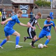 Dunbar United (black and white) and Sauchie Juniors could not be separated after 90 minutes. Image: Gordon Maitland