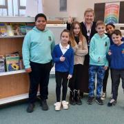 Pupils with head teacher Zena Diggle get ready to celebrate A Wonderful World of Words at Wallyford!
