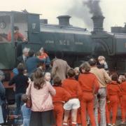 A print dated to between 1975 and 1995 depicting a steam engine bearing the name Prestongrange surrounded by a large crowd, probably at the Prestrongrange Mining Museum, Prestonpans.