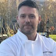 Stuart Aitken, culinary lead for BaxterStorey, at Queen Margaret University's allotment
