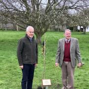 Roderick Urquhart, Lord Lieutenant of East Lothian, alongside former Lord Lieutenant Michael Williams, and the newly-planted tree