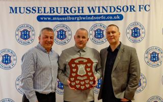 John Murray Shield, the club's top accolade, is presented to David Steel, centre. Looking on are, left, Allan Russell, club chairman, and, right, Jim Dickson, vice-chairman Photo: Stefanie Talac